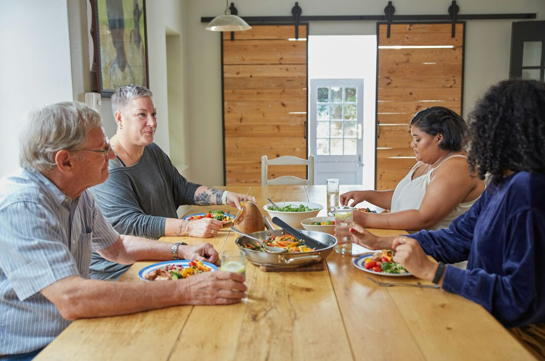 seniors sharing meal together